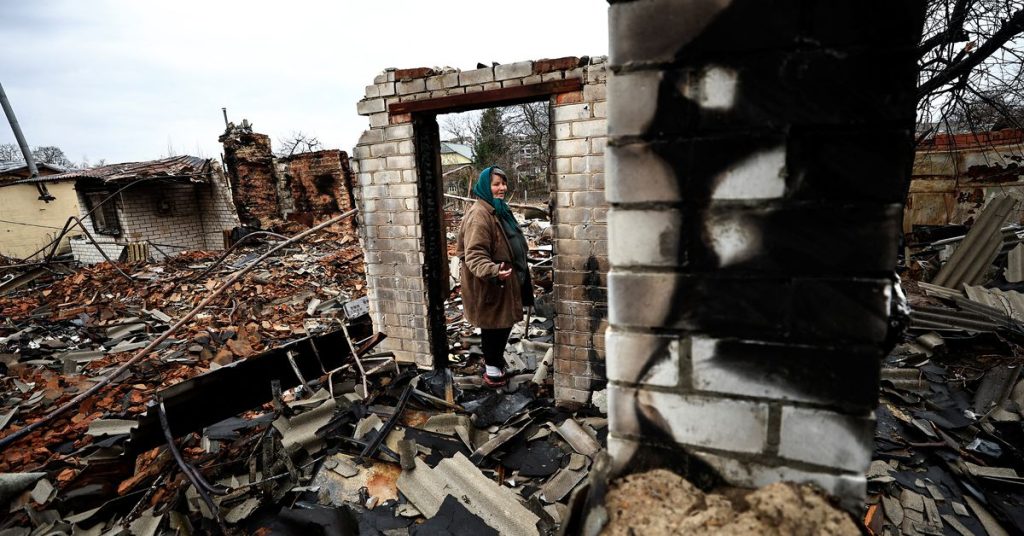 Dozens of Ukrainians found in grave near Kyiv as battle looms in east