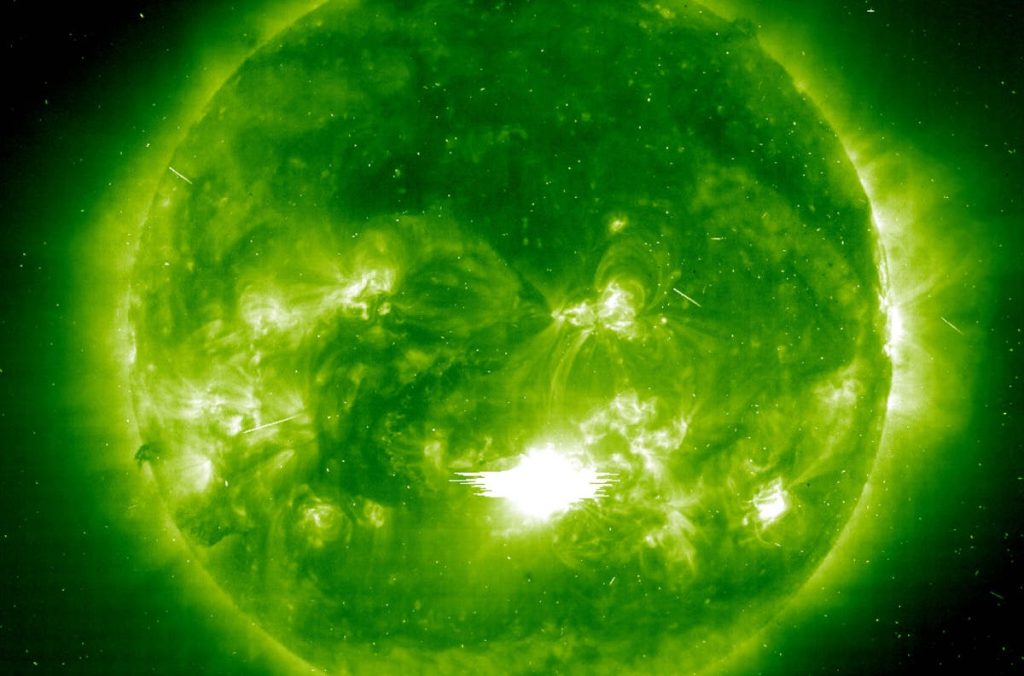 Warning of a major solar storm after a large explosion from the sun hit Earth