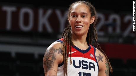 Griner watches during the USA vs Serbia match at last year's Tokyo Olympics. 