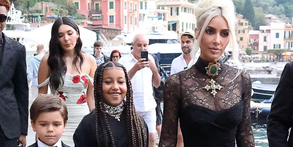Kim Kardashian shares some behind-the-scenes snapshots of Kourtney's wedding