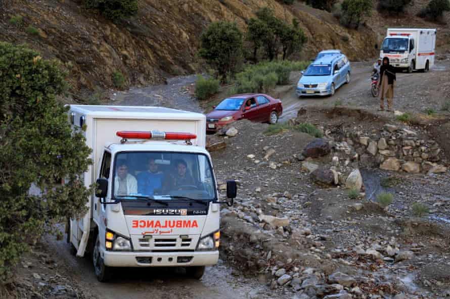 An ambulance transports earthquake victims to a hospital in Paktika state.