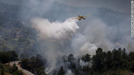 Portugal suffers from severe drought, while planes put out forest fires in Ourem, north of Lisbon. 