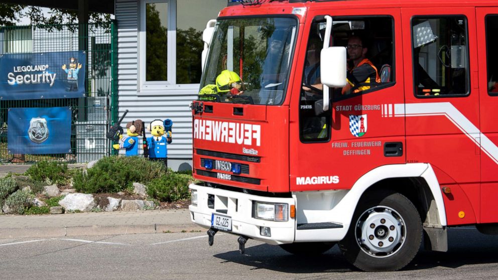 Photo: A firetruck drives through the entrance to Legoland, August 11, 2022 in Bavaria, Germany. 