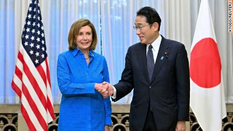 House Speaker Nancy Pelosi shakes hands with Japanese Prime Minister Fumio Kishida in Tokyo on August 5, 2022.