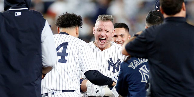 Josh Donaldson #28 of the New York Yankees reacts after hitting one during the 10th inning against the Boston Red Sox at Yankee Stadium on September 22, 2022 in the Bronx borough of New York City.  The Yankees won 5-4.