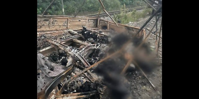 The photo was taken on October 1 of the September 25 attack on seven civilian cars in the Kharkiv region that killed 24 people, including 13 children and a pregnant woman.