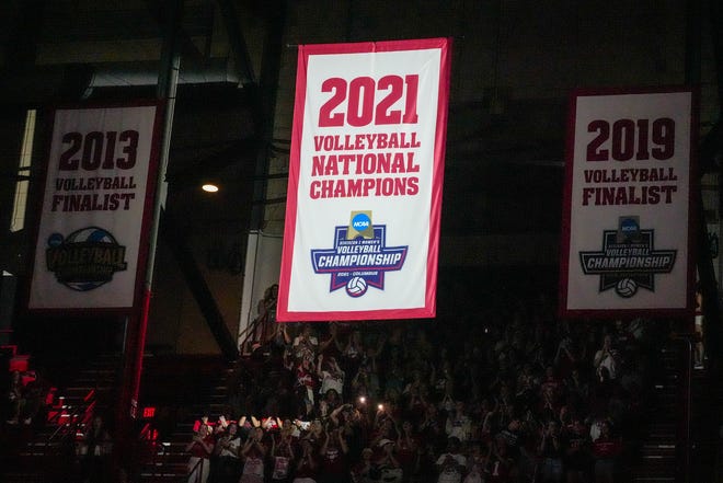 The Wisconsin Badgers unveil the logo for the 2021 NCAA Volleyball Championships at UW Field House.