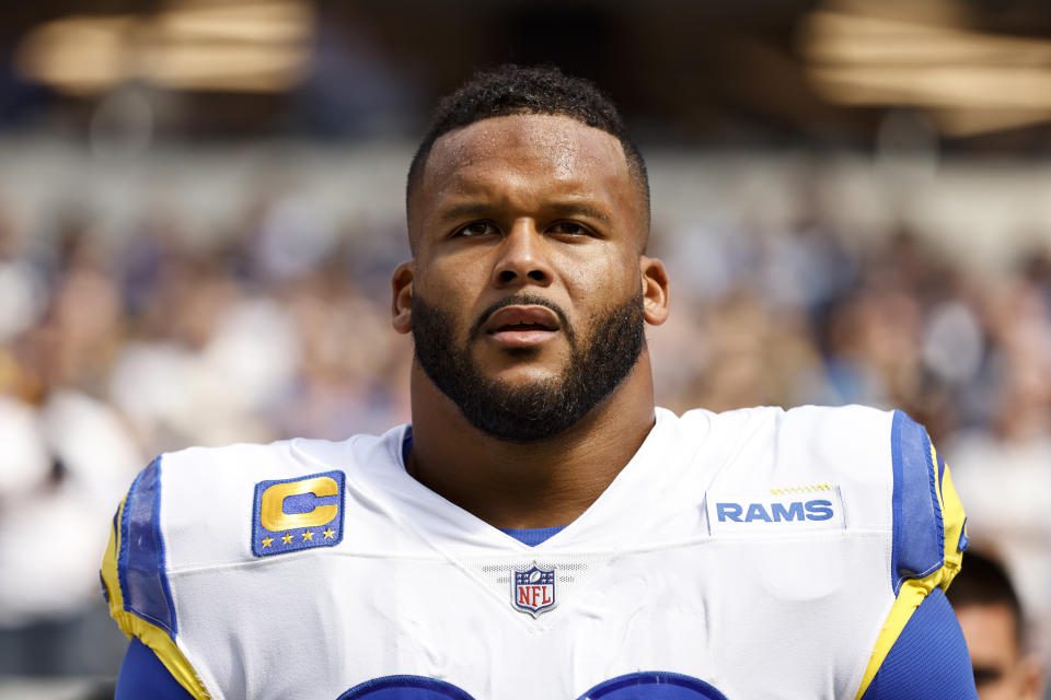 INglewood, CA - OCTOBER 9: Aaron Donald #99 of the Los Angeles Rams looks on during the national anthem before an NFL football game against the Dallas Cowboys at SoFi Stadium on October 09, 2022 in Englewood, California.  (Photo by Michael Owens/Getty Images)