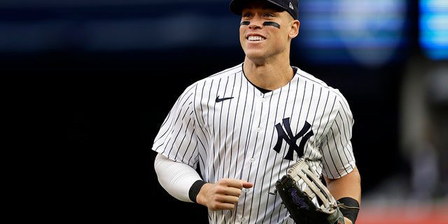 New York Yankees right fielder Aaron Judge runs to the dugout during the sixth inning of the team's baseball game against the Baltimore Orioles on Saturday, October 1, 2022, in New York. 