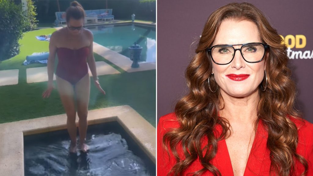 Brooke Shields shows off her toned body in a red swimsuit for an icy Thanksgiving dip