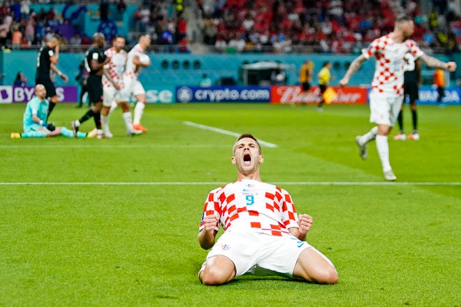 Croatia's Andrej Kramaric celebrates after scoring in the first half against Canada.