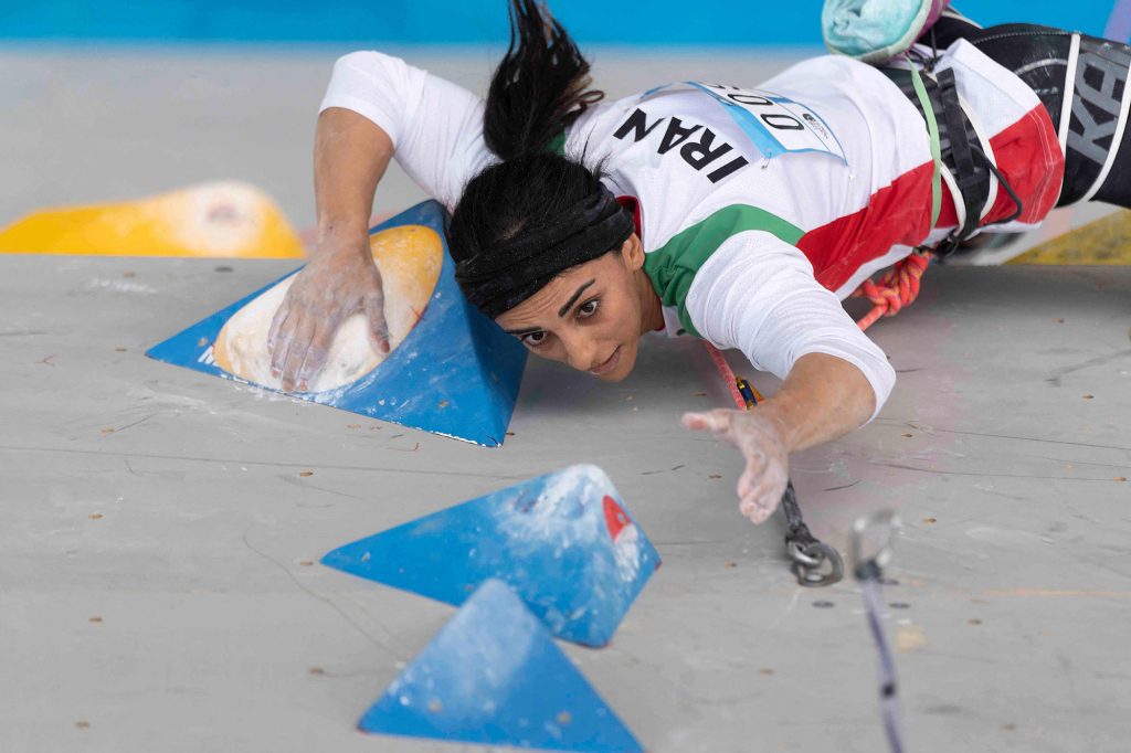 Iranian rock climber Elnaz Rekoi is reportedly under house arrest to compete abroad without wearing the mandatory headscarf.