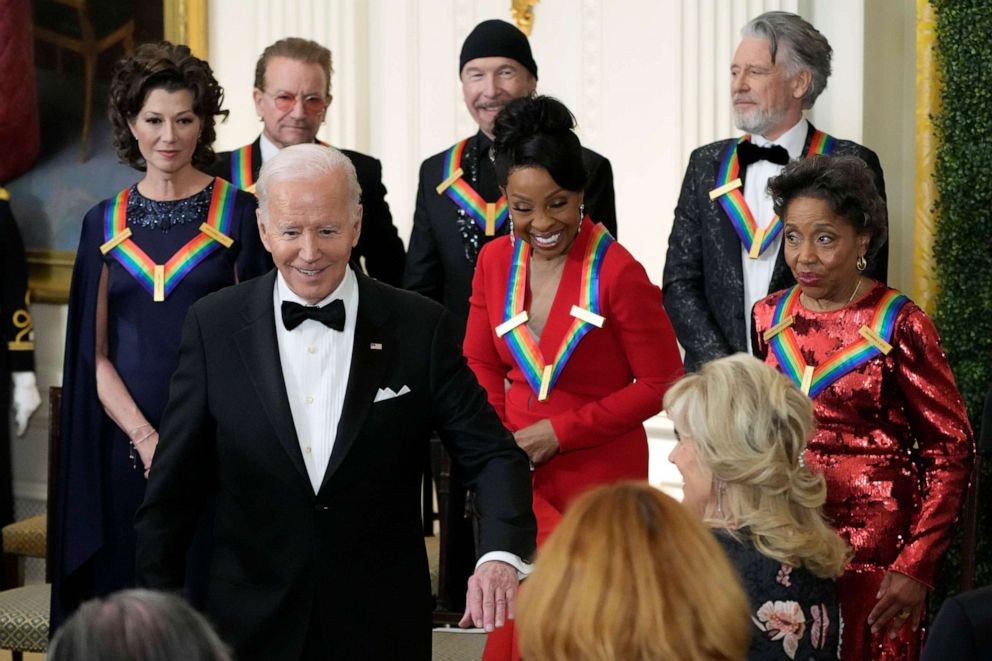 PHOTO: President Joe Biden extends his arm to First Lady Jill Biden as they leave the Kennedy Center to honor the White House reception, December 4, 2022, in Washington.