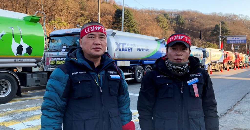 “We are not your enemies,” said South Korean truck drivers who are on strike to protect the minimum wage
