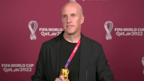 Wall is pictured at the awards ceremony in Doha during the World Cup. 